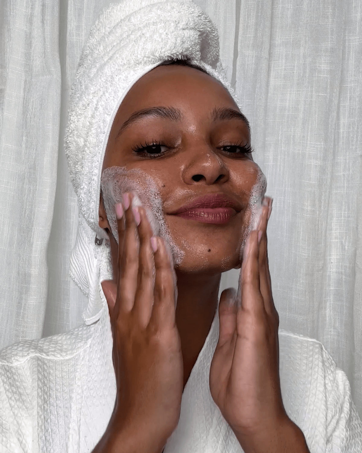 Load video: Take the day off cleansing balm application video