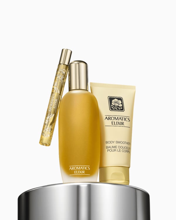 Aromatic Elixir Riches: Perfume Set , A bold fragrance trio for head-to-toe intrigue. Featuring a full-size perfume, an on-the-go mini, and body smoother lotion.