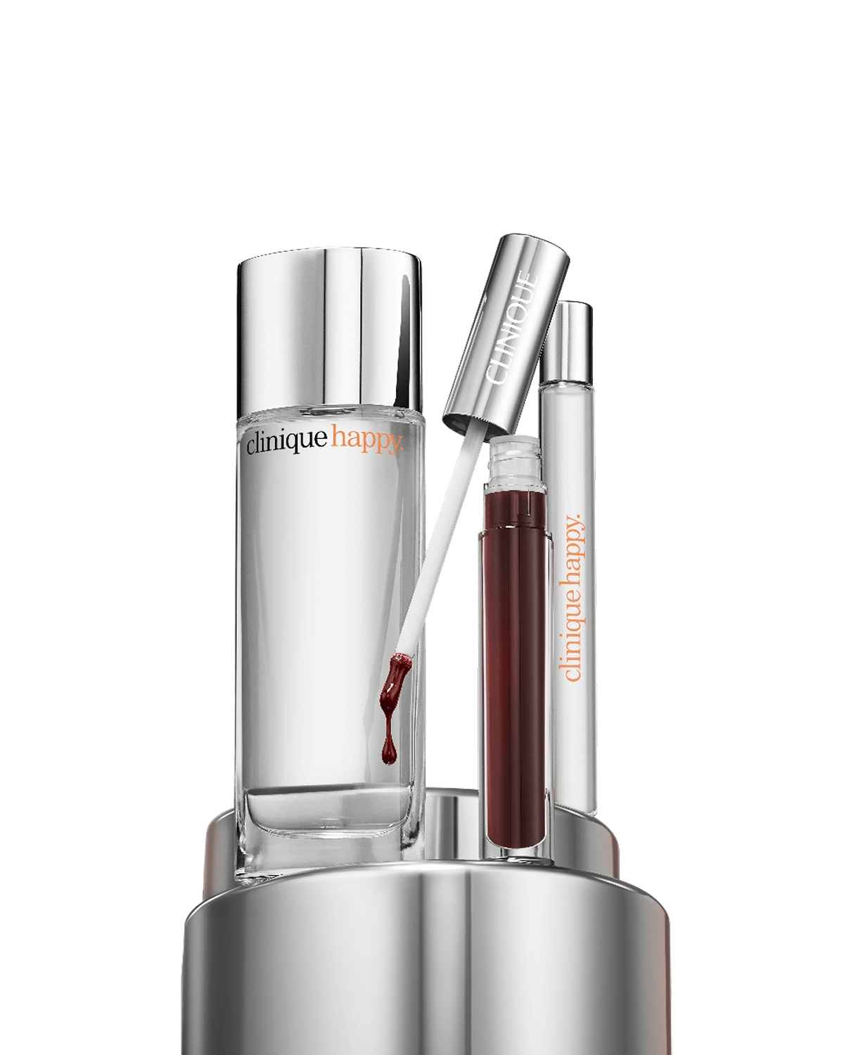 Perfectly Happy: Perfume Set, Shine happily. Two sizes of the citrus-floral fragrance Clinique Happy™, plus a high shine lip gloss.