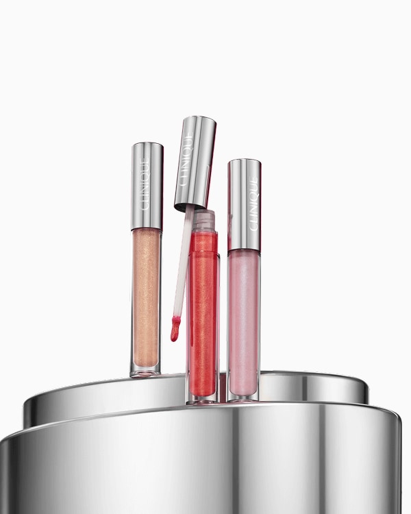 Pop Treats: Pop Plush Lip Gloss Set, A trio of full-size Clinique Pop Plush™ Creamy Lip Gloss in three dazzling, limited-edition shades for the holidays.
